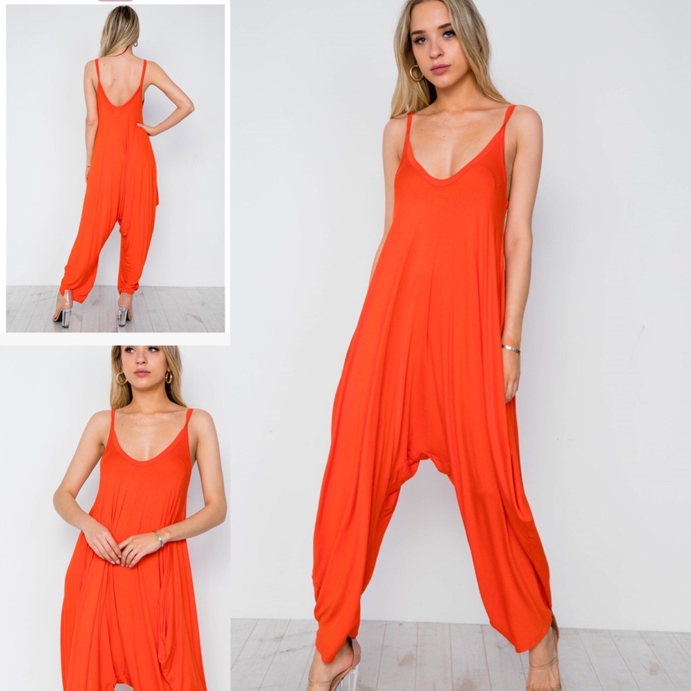 Haram romper in that bright orange that’s popping